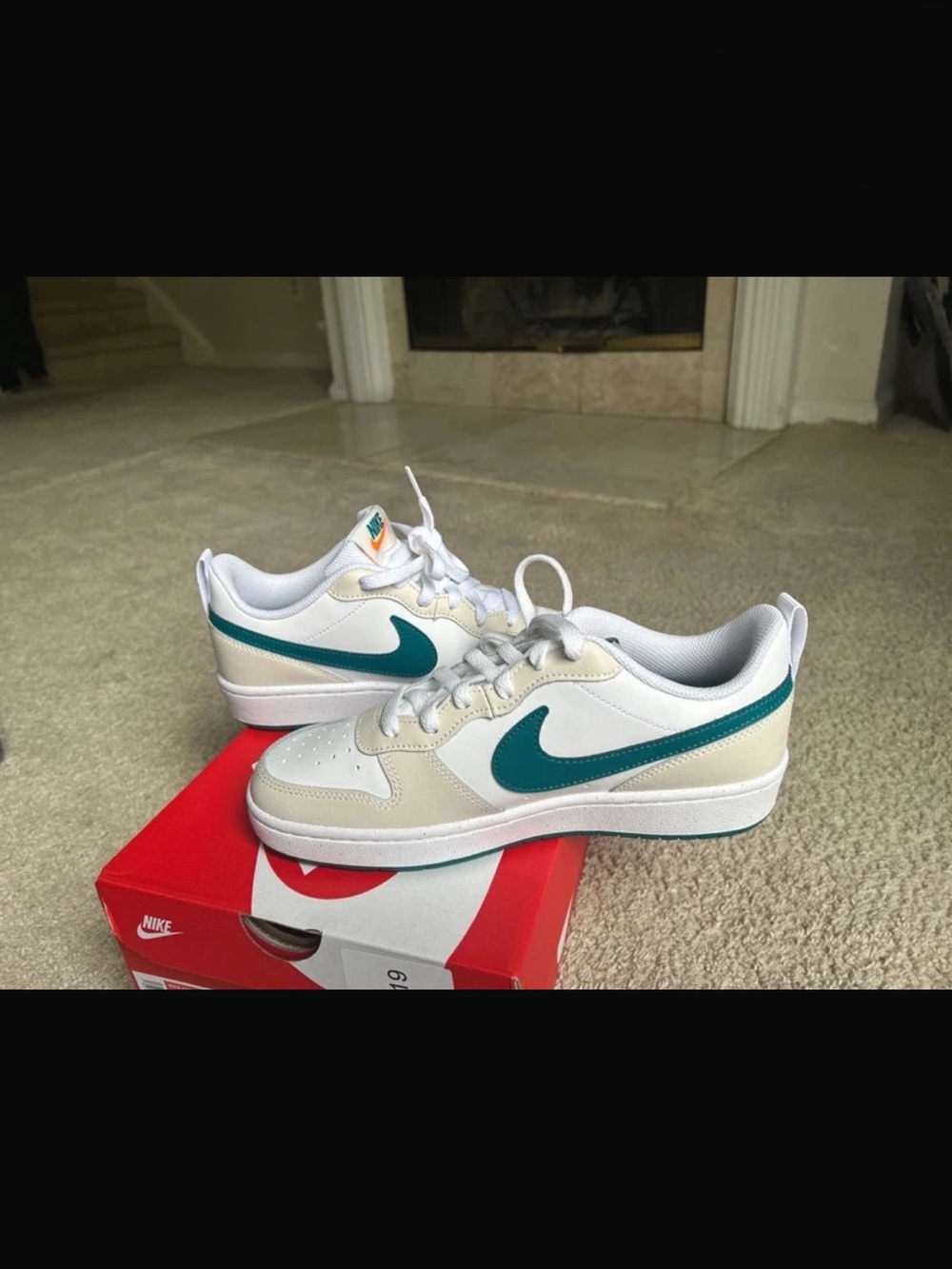 Nike Kids White Sneakers with Teal Swoosh and Cream Panels